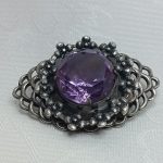 Брошь с аметистовым стеклом, серебрение