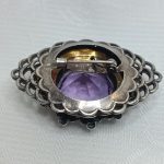 Брошь с аметистовым стеклом, серебрение