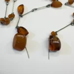 Колье янтарь на иголках иголки